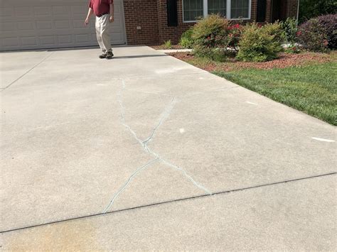 Concrete Repair - Stabilizing and Sealing Cracks in Concrete Driveway ...