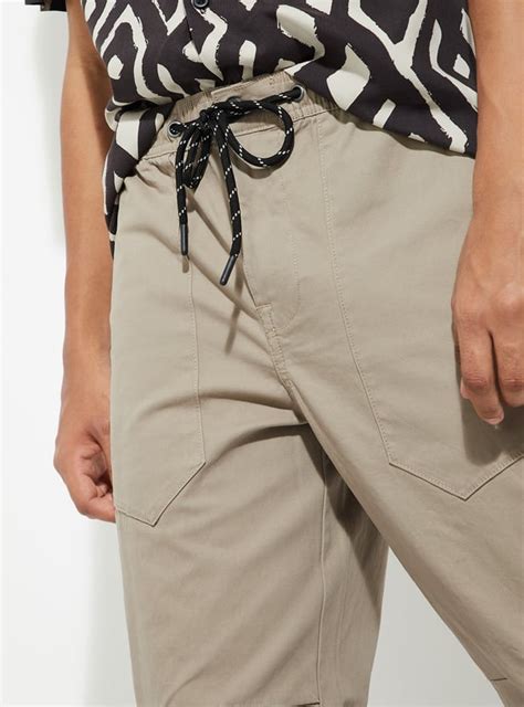 Buy URB_N Men Textured Relaxed Fit Joggers Online at just Rs. 1299.0 ...
