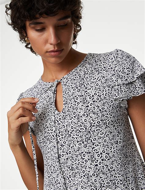 Buy Jersey Printed Tie Neck Mini Smock Dress at Marks & Spencer