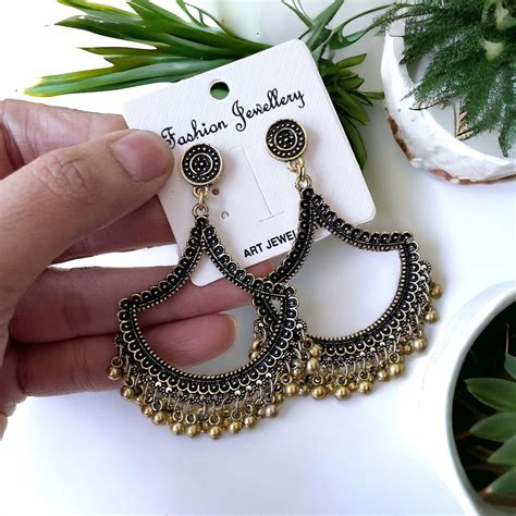 E03 - Golden Petal Shaped Oxidised Earring | ClartStudios