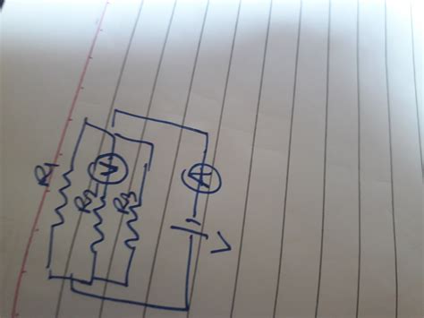 Explain with a help of labelled circuit diagram how you will find the ...