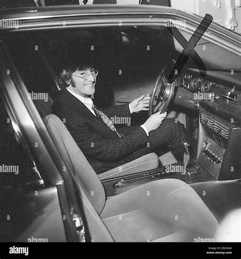 Beatles files 1967 John Lennon at the London Motor Show Stock Photo - Alamy
