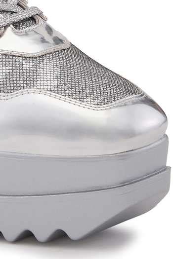 Buy Silver Razzle Wedge Sneakers by Anaar Online at Aza Fashions.