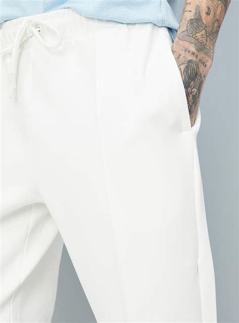 Buy Men Solid Active Track Pants Online at just Rs. 1199.0 ...