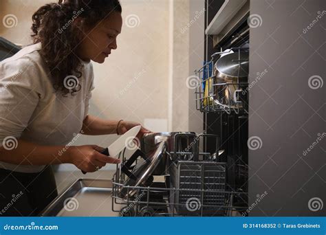 Authentic Housewife Taking Out Kitchen Clean and Sterilize Kitchen ...
