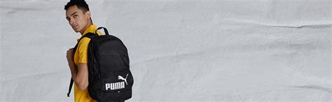 Buy Puma Laptop Backpack IND I CASTLEROCK-Vibrant Orange Packable Rain ...