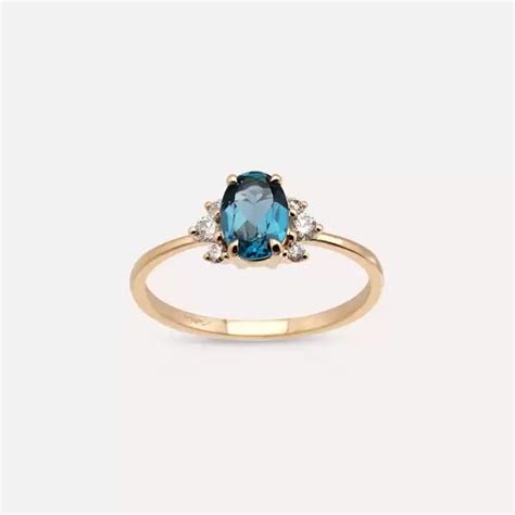 1.02 CT London Blue Topaz and Diamond Rose Gold Ring