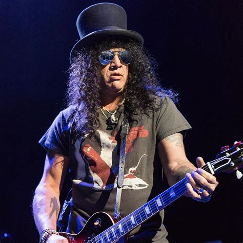 Slash Biography • Saul Hudson British–American Musician & Songwriter