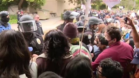 Members of law enforcement enter a Pro-Palestinian encampment at UCLA on May 2, 2024 in Los Angeles,