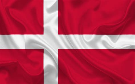 the flag of england is waving in the wind