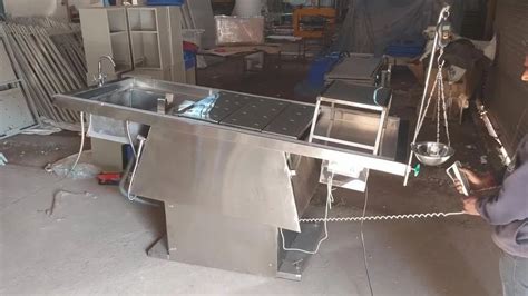 Mortuary Equipment - Folding postmortem table Manufacturer from Ambala