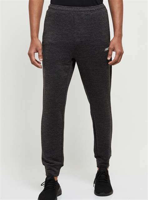 Buy Men Solid Elasticated Joggers Online at just Rs. 799.0 ...