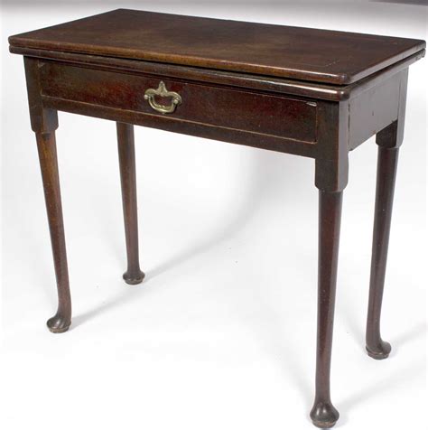 Lot 681 - A rectangular card table of George II design,
