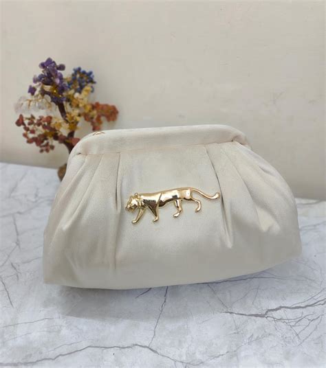 Beige Sabyasachi pouch bag – VRPS Handicrafts