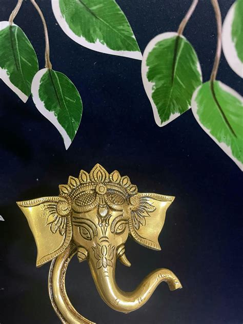 Brass Ganesh Diya Oil Lamp with Floating Trunk - Divine Illumination ...