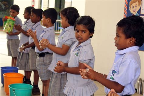 Brushing Activity Photos - Muthamil Public School