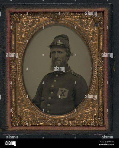 Unidentified soldier in Union uniform of the 56th New York Volunteers (10th Legion) and forage ...