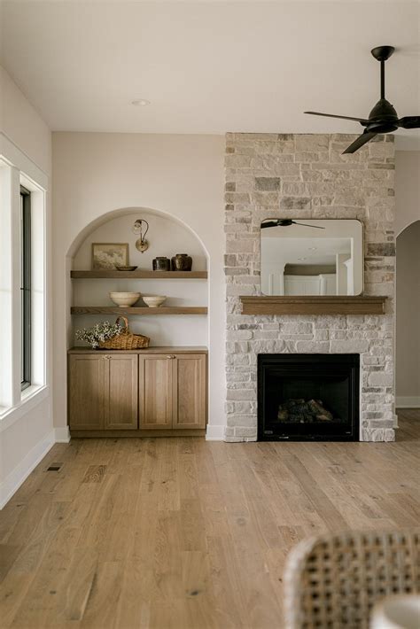 Stylish Arch Fireplace Built-Ins
