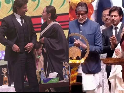 Rani Mukerji kisses Shah Rukh Khan's hand while he touches Amitabh ...