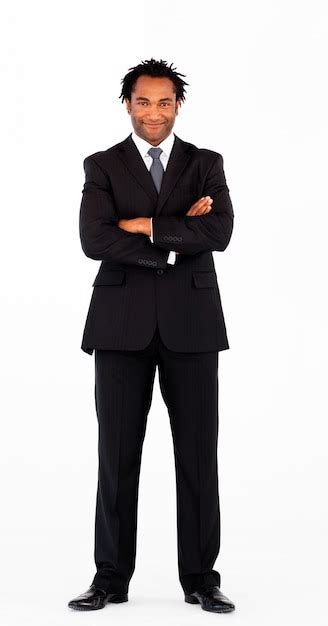 Friendly businessman with crossed arms | Premium Photo