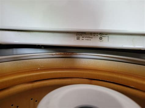 Image result for Rust On Washing Machine Lid
