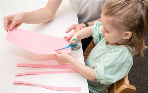 Image result for Child Using Scissors