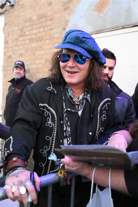 Johnny Depp shocks fans with new look, but why is he in NYC?