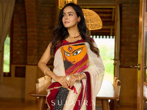 Striking white cotton saree with bold red-black borders, featuring a h ...
