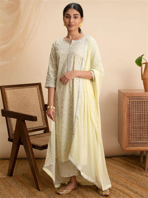Buy Yellow Printed Cotton Straight Kurta With Palazzos & Dupatta Online ...