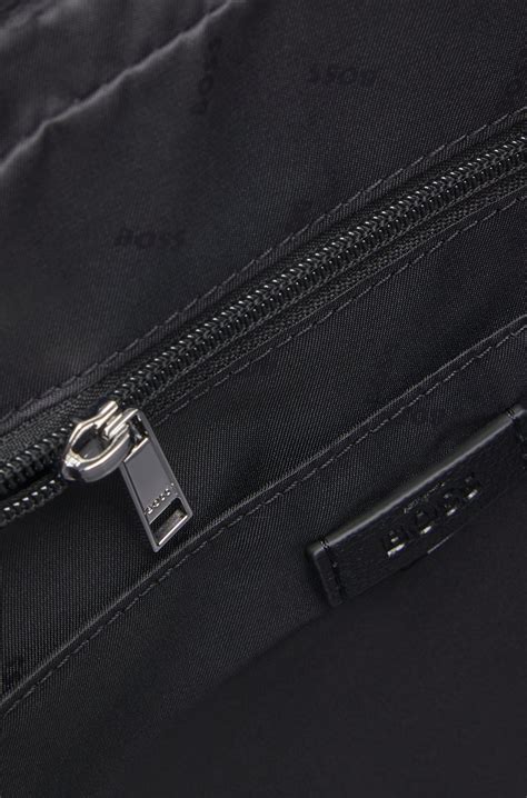 BOSS - Grained faux-leather messenger bag with embossed logo - Black