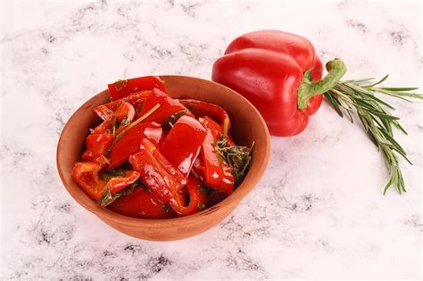 Pickled red bell pepper in the bowl | Premium Photo