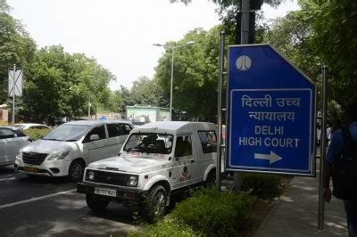 Do not use saliva to affix fee stamps, directs Delhi court