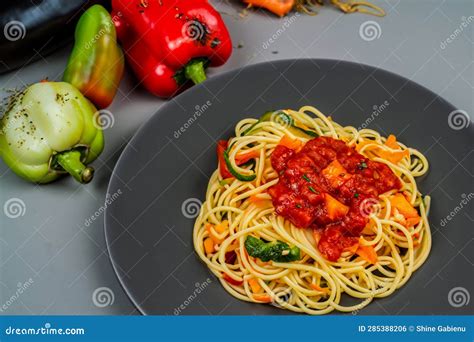 African Traditional Spaghetti Pasta with Spicy Sauce and Vegetable ...