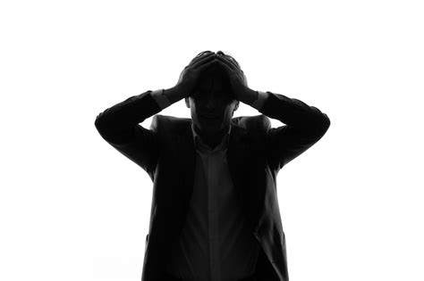 Male person silhouette in strict suit looking stressed shadow white ...