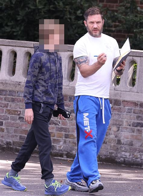 Tom Hardy cuts a casual figure as he goes shopping with his eldest son ...