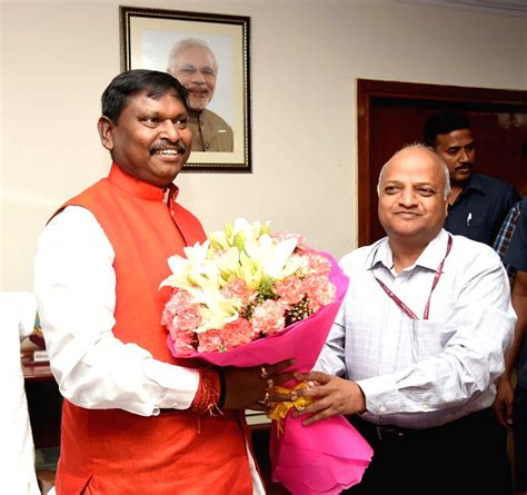 Union Tribal Affairs Minister Arjun Munda being greeted by Ministry of ...