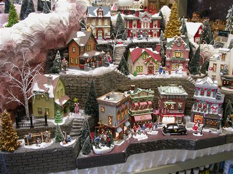 a christmas village with lots of houses and trees