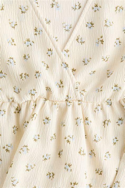 Women's Cream/Floral Crinkled jersey top | H&M IN