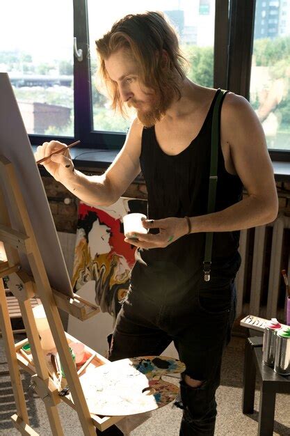 Inspired man painting | Premium Photo