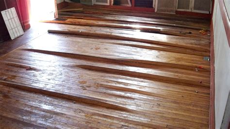 Hardwood Floor Water Damage Warping | Engineered wood floors, Flooring ...