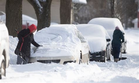 Photos: Jackson residents dig out after overnight snowstorm - mlive.com