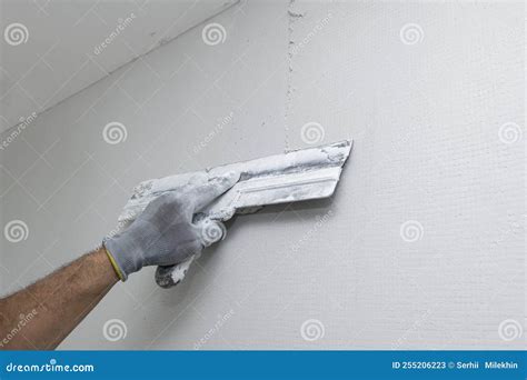 Plasterer Applies Plaster on the Wall during Repair and Restoration ...