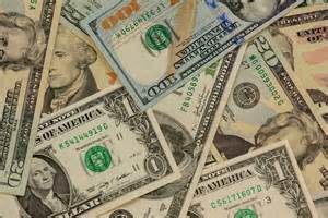 Dollar Sees Support from Positive Empire Report and Reduced Fed Rate-Cut Expectations