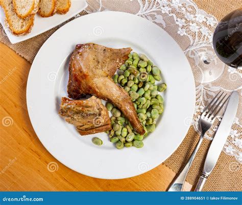 Oven-baked Rabbit Leg with Braised Beans in Bowl, Top View. Stock Image ...