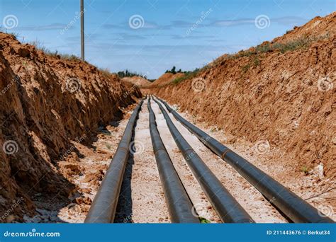 Metal Technological Pipelines in a Trench in the Middle of the Steppe ...