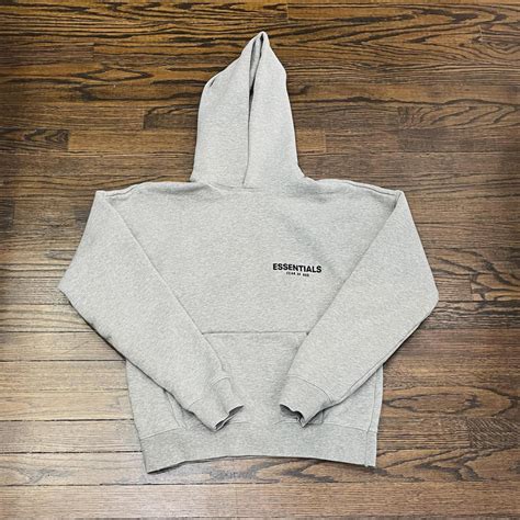 Grey essentials hoodie brand new - Depop
