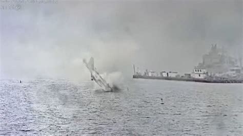 Dramatic video shows military jet crash in San Diego Bay