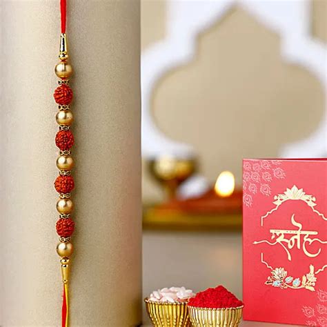Send Earthly Blessings Rudraksha Rakhi Online | Rakhibazaar.com