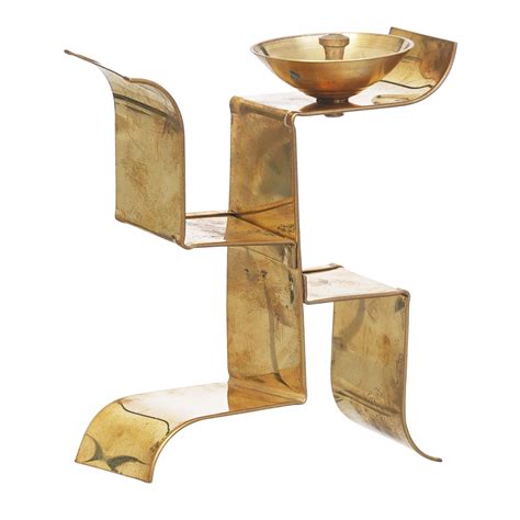 eCraftIndia Golden Metal Swastik Symbol Shape Designer Diya