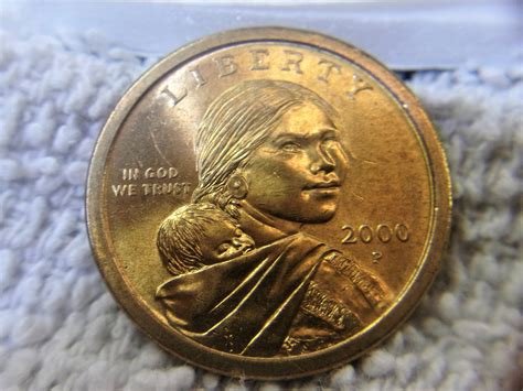 SALE 2000-P Sacagawea Dollar Distinctive Golden Dollar Coin Depict A ...
